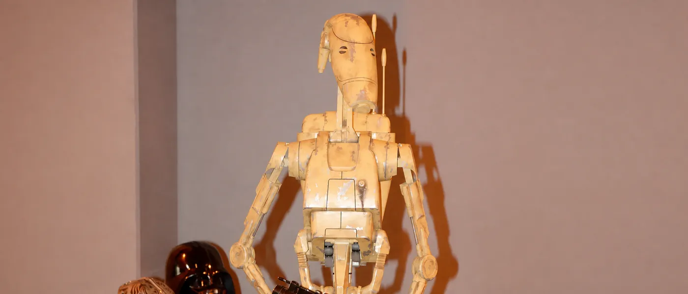 A person dressed as a Star Wars battle droid at a science-fiction event